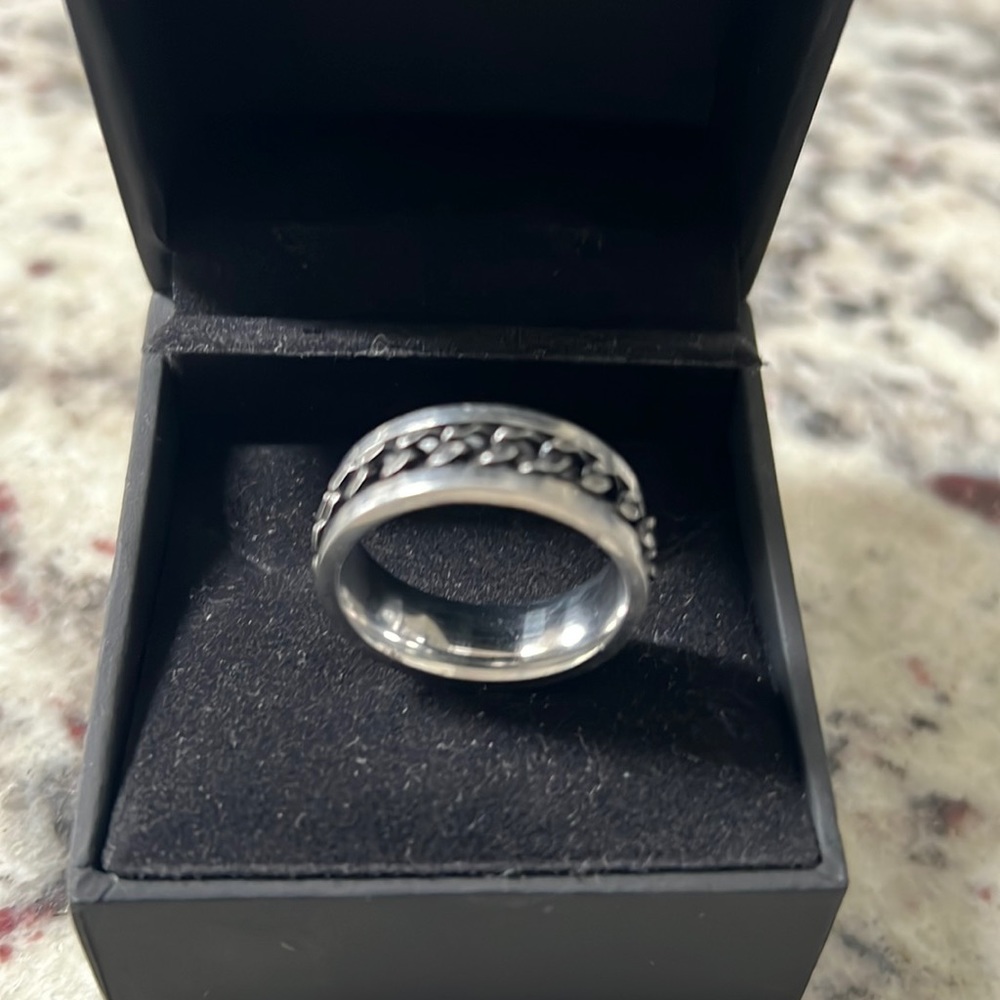 Men’s size 11 ring with chain around ring , great for work or casual wear